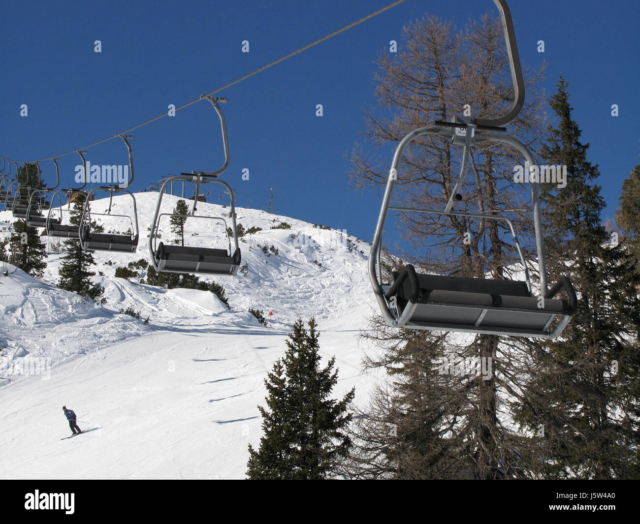 chair lift skilift armchair tree winter advancement skiregion chair