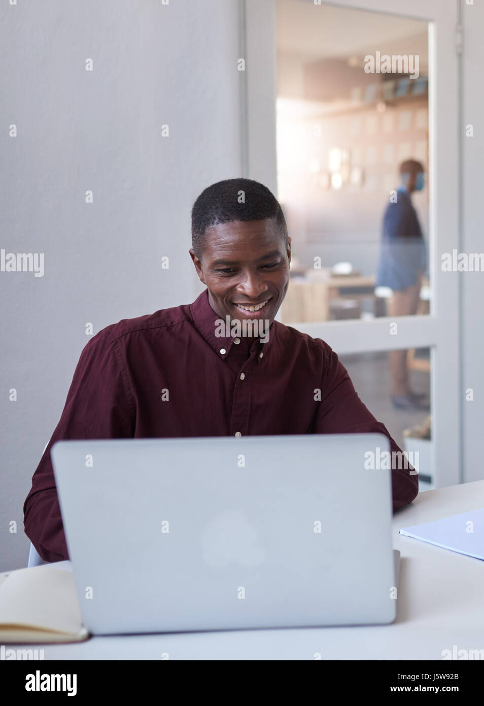 Young African businesspeople at work in an office Stock Photo
