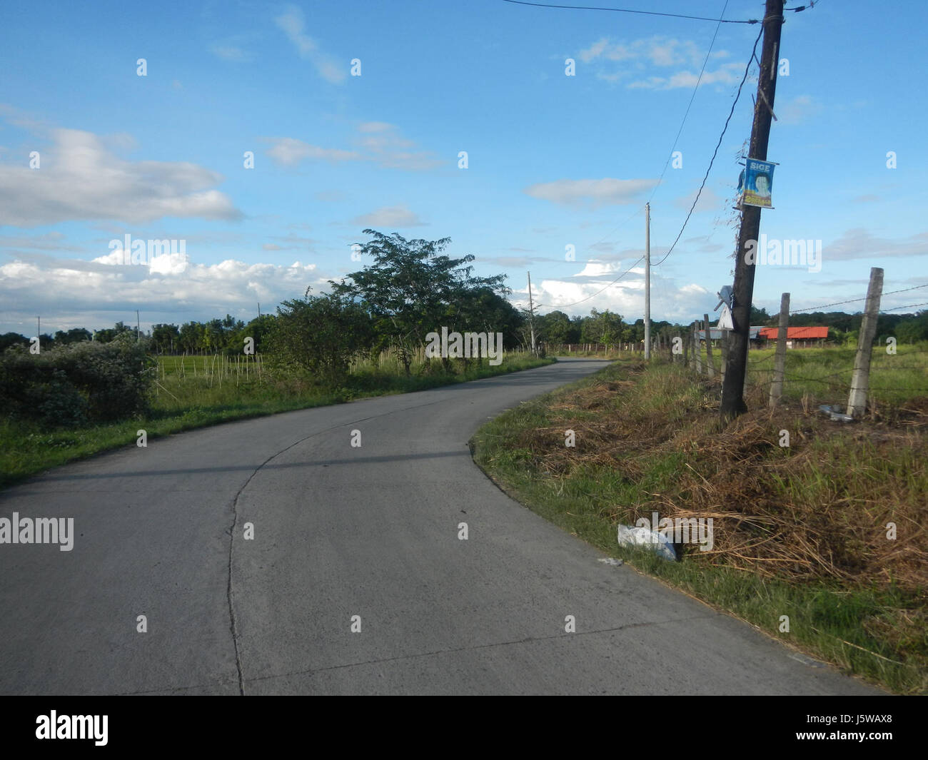 This image depicts the rural landscape of the Philippines, specifically ...