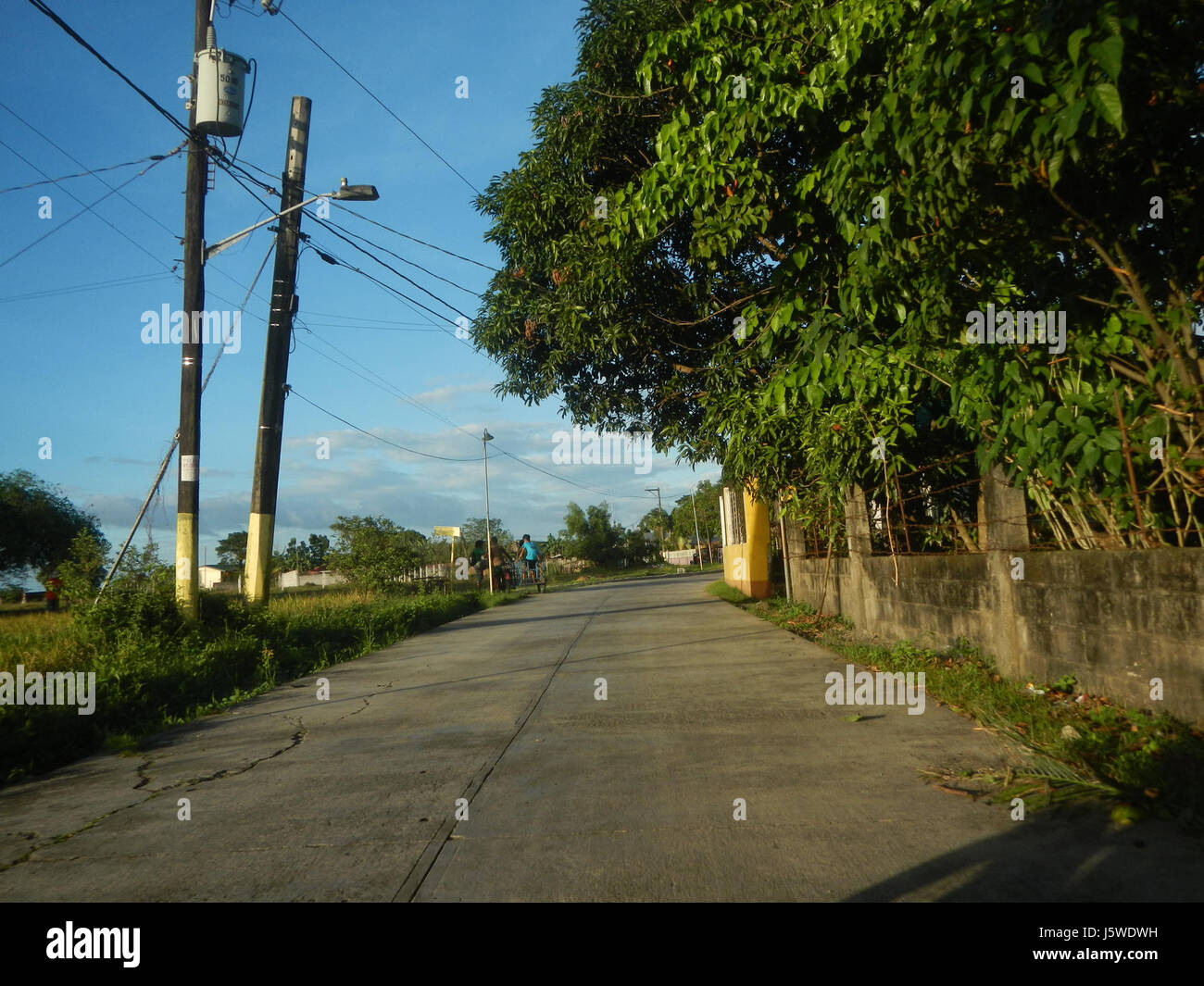 This image shows a rural landscape of Barangay Bulacan, focusing on the ...