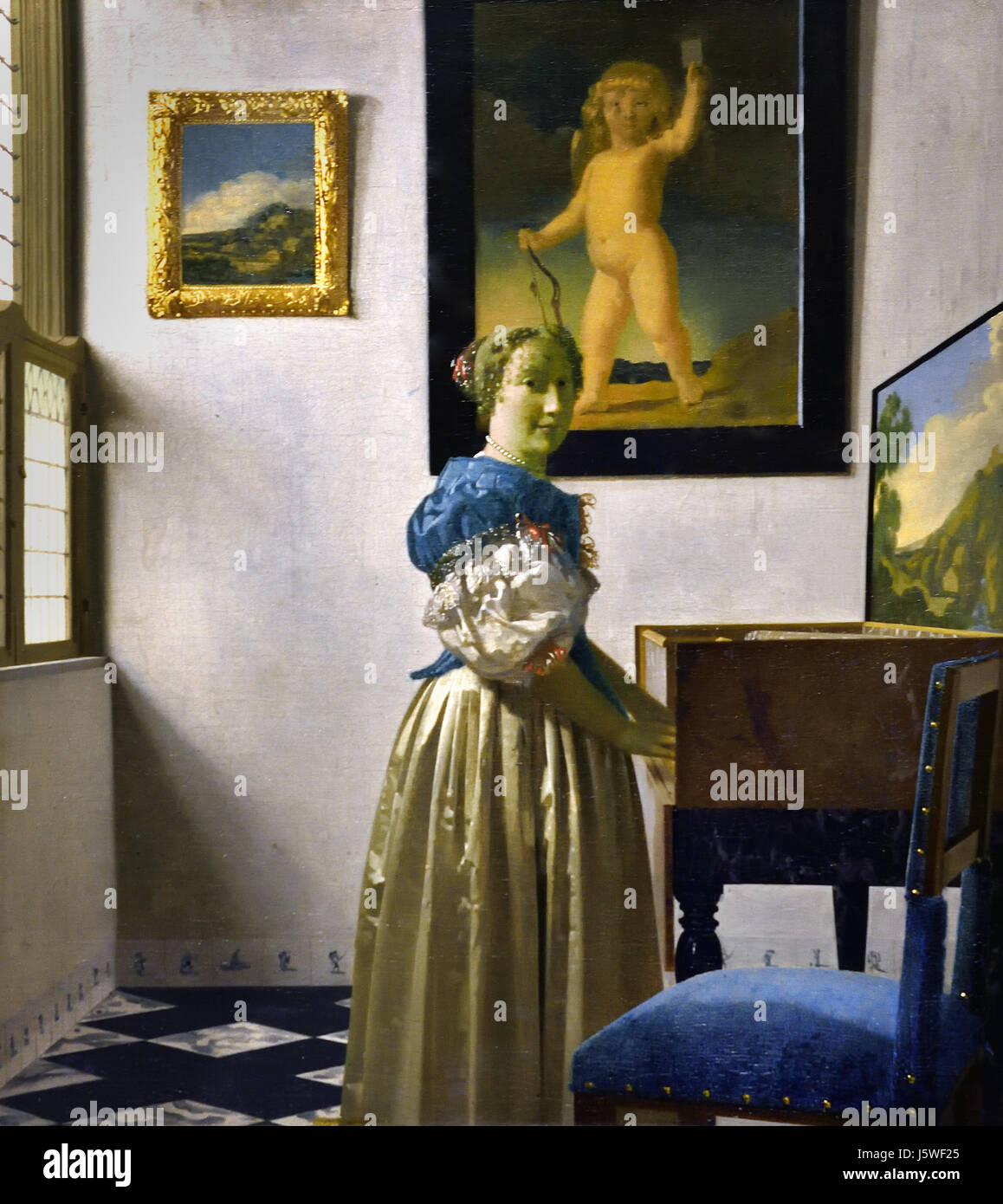 A Young Woman standing at a Virginal 1670-2 Johannes Vermeer 1632 - 1675 Dutch The Netherlands Stock Photo