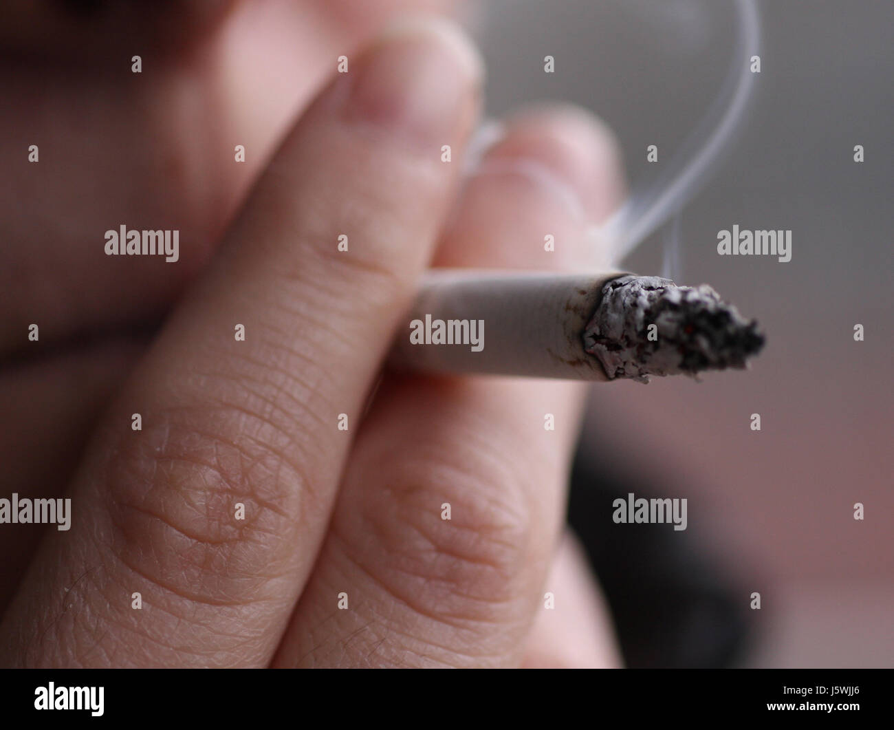smoke smoking smokes fume cigarette material drug anaesthetic addictive drug Stock Photo