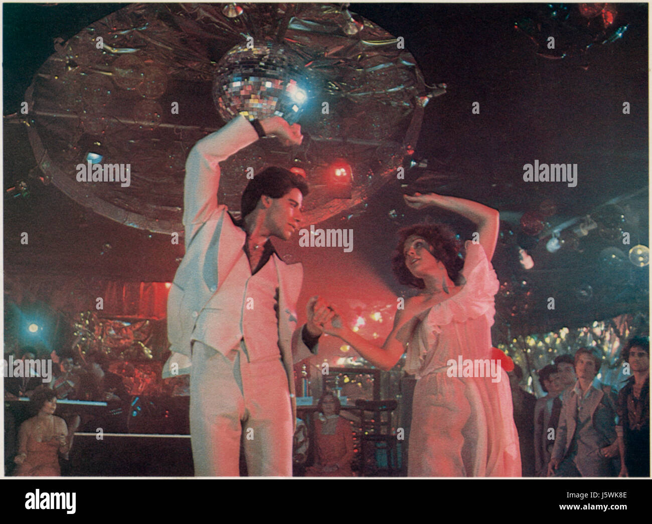 John Travolta, Karen Lynn Gorney, on-set of the Film, 'Saturday Night Fever', 1977 Stock Photo