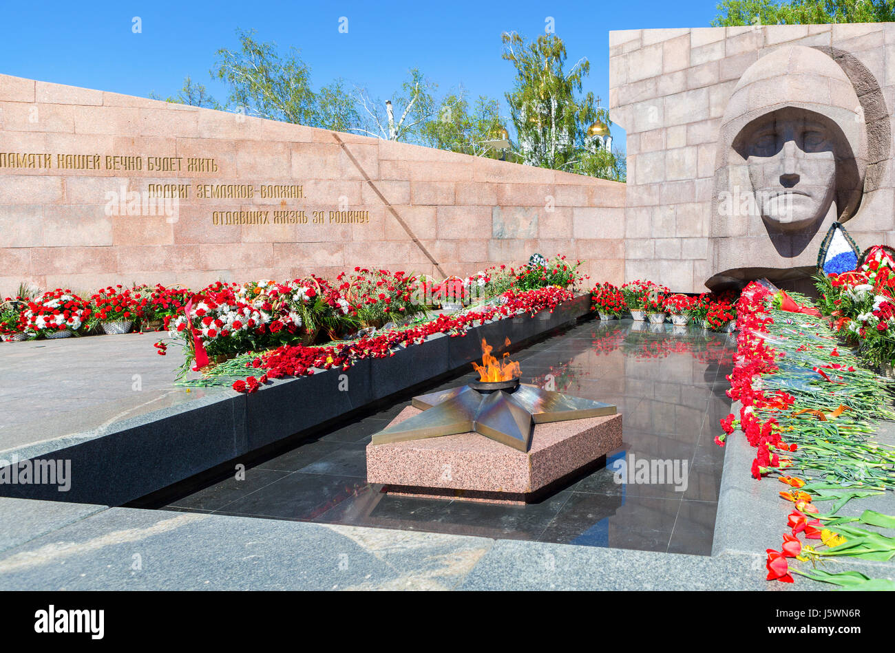 Samara, Russia - May 14, 2017: Eternal flame and flowers in memory of the Victory in the Great Patriotic War Stock Photo