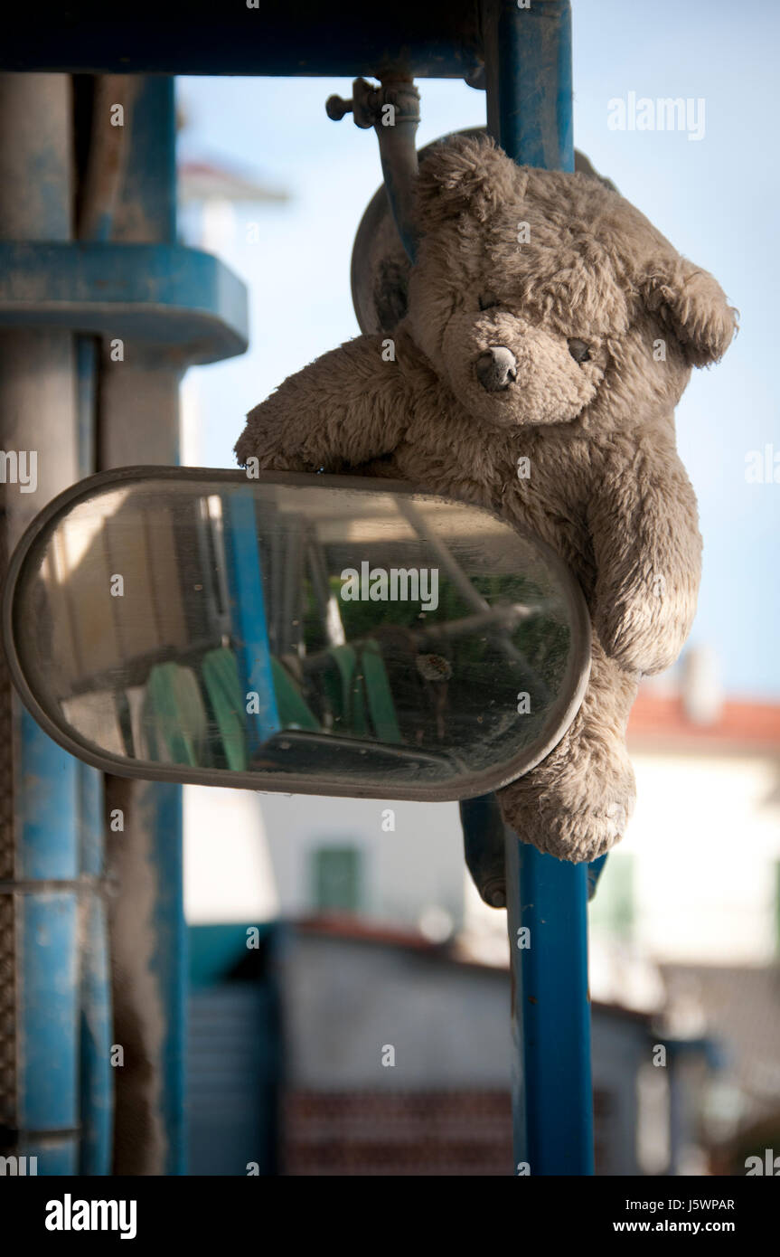A teddy bear on a tractor. Stock Photo