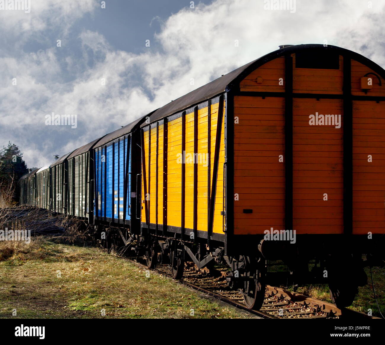 coloured colourful gorgeous multifarious richly coloured transport wagon put Stock Photo