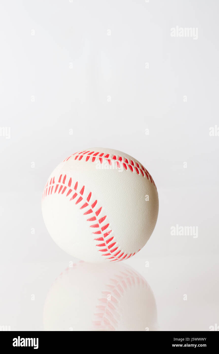 ball sport-turned out baseball pale bright pure white snow white sport sports Stock Photo