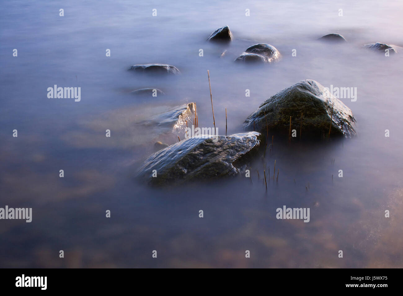 stone longterm exposure rock salt water sea ocean water bank stones