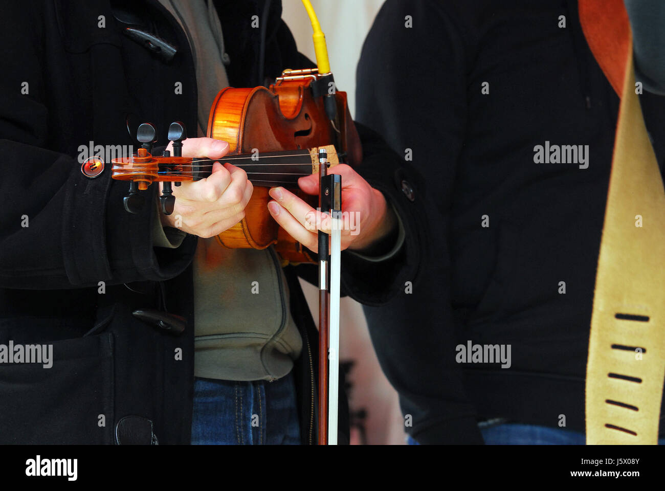 music string violin bowed instrument rip measure instrument method man musical Stock Photo