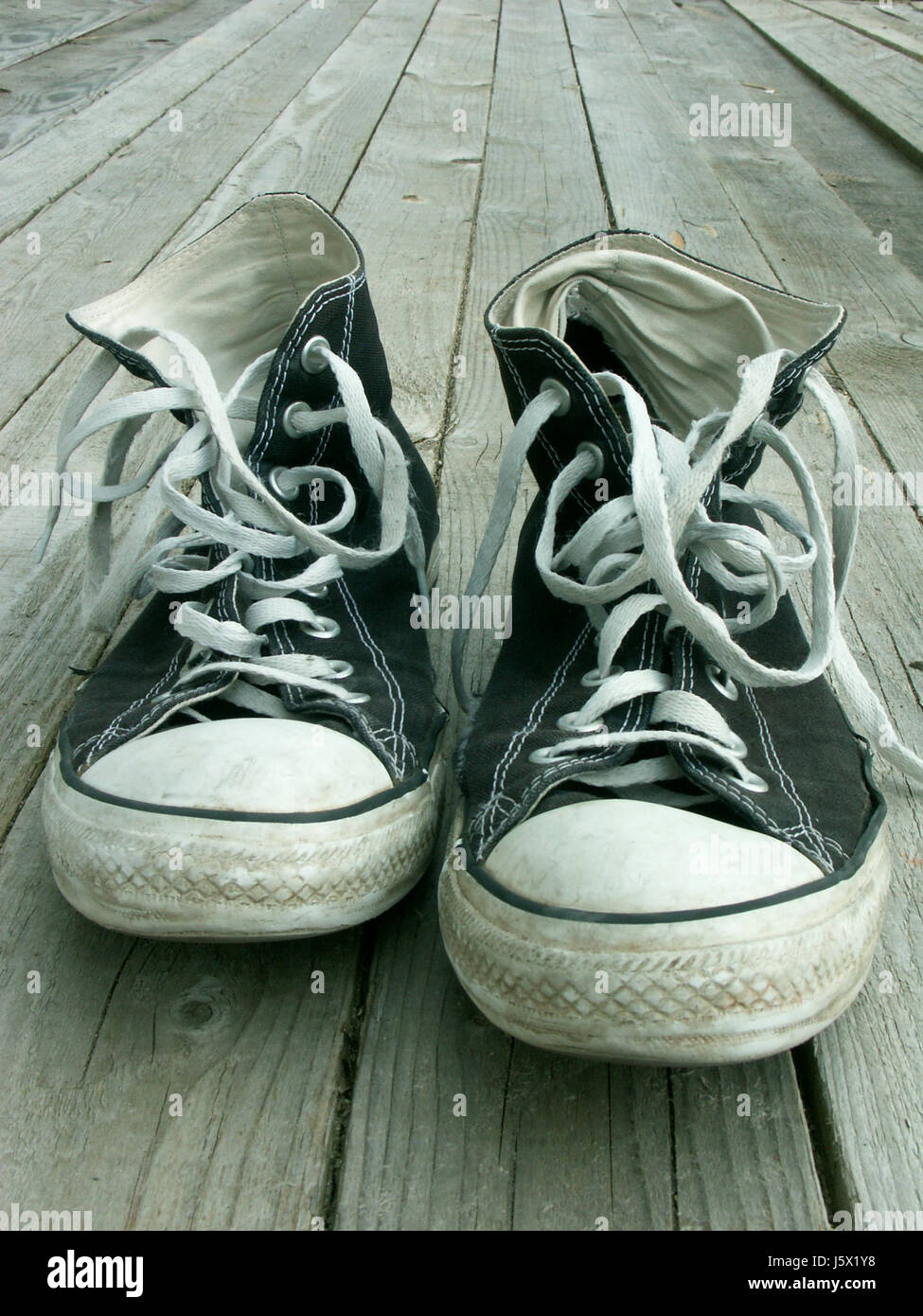 Worn out converse hi-res stock photography and images - Alamy