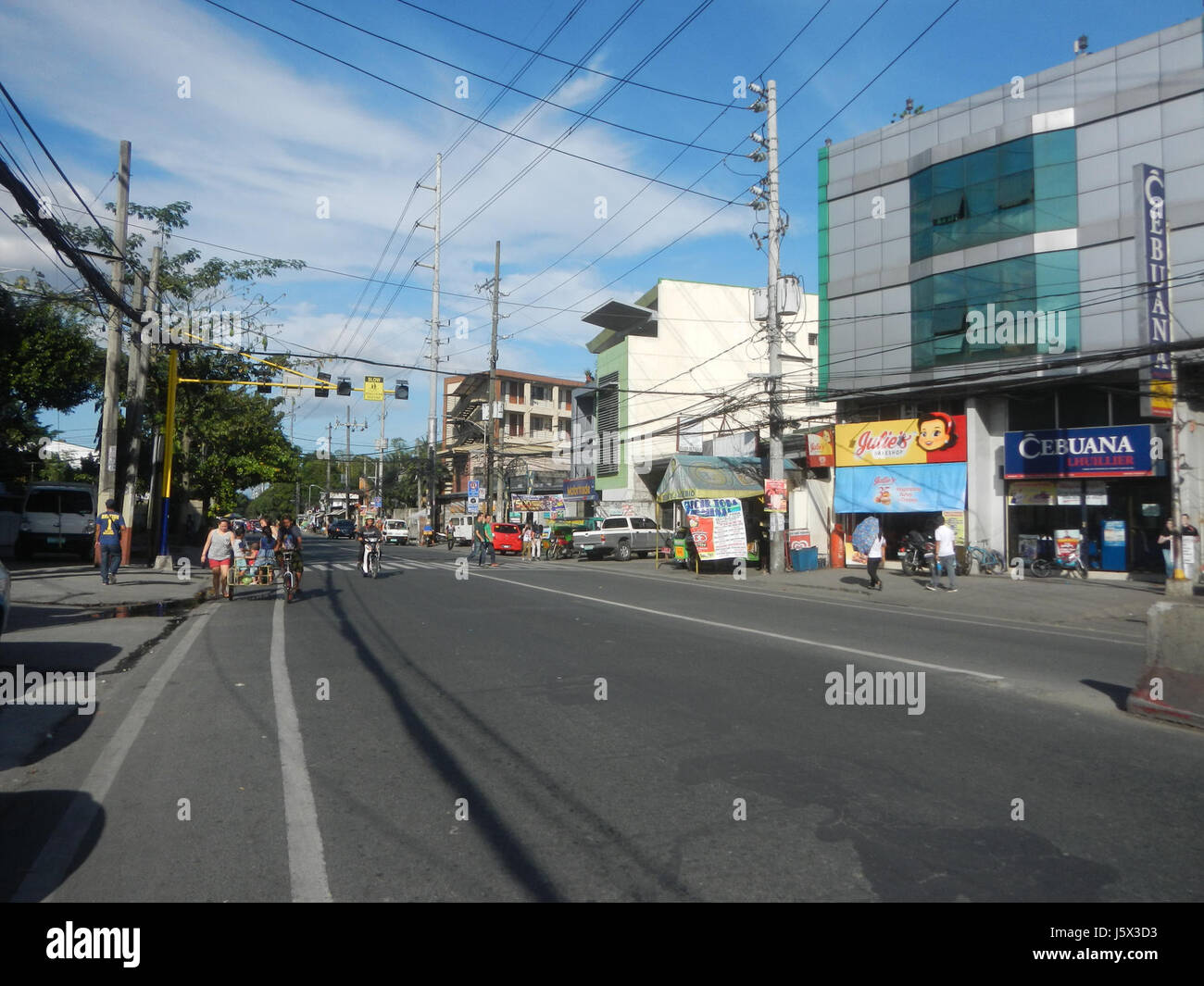 The intersection of Amang Rodriguez Avenue, Water Rosario, and Ortigas Avenue Junction in Pasig City is a key traffic and commercial area in Metro Manila. Stock Photo