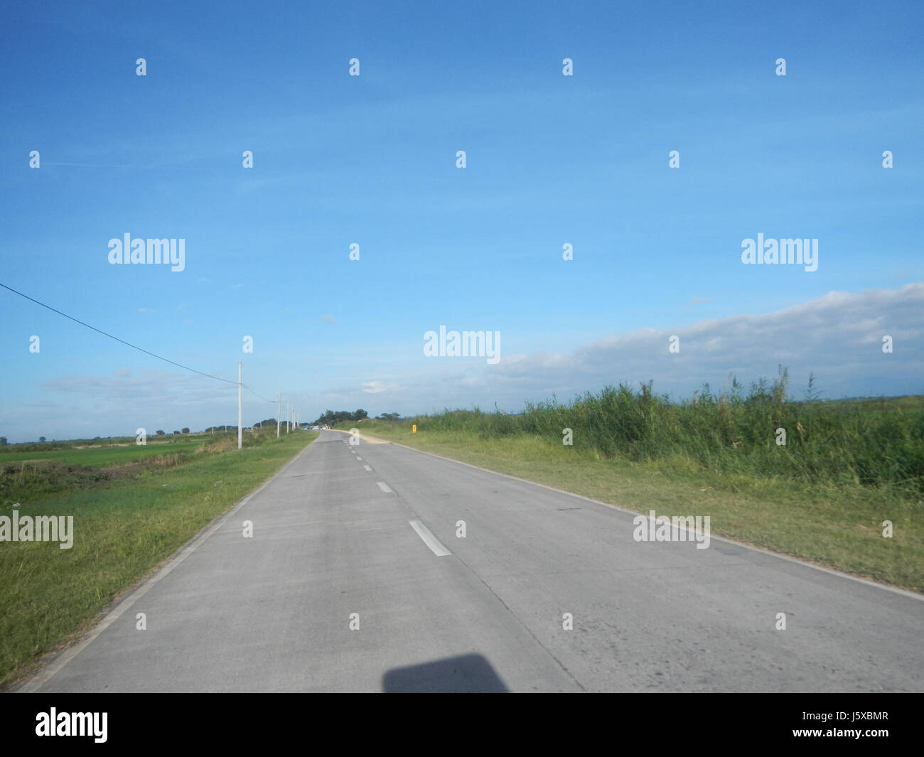This image depicts the rural landscape in Candaba, Pampanga ...