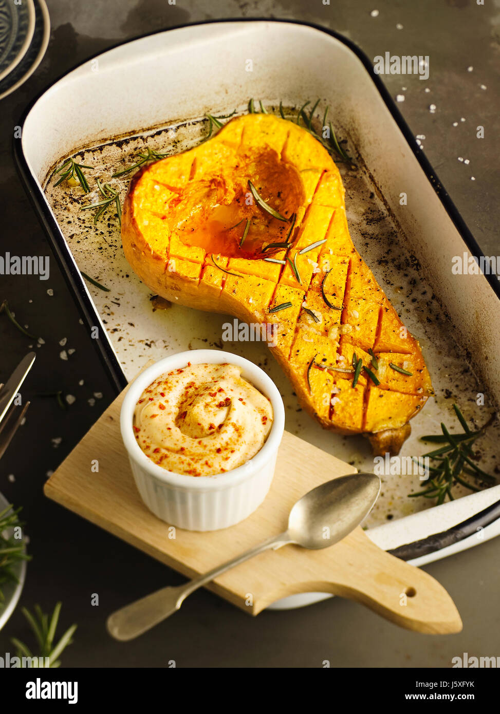 Butternut pumpkin from the oven with chili mayonnaise Stock Photo - Alamy