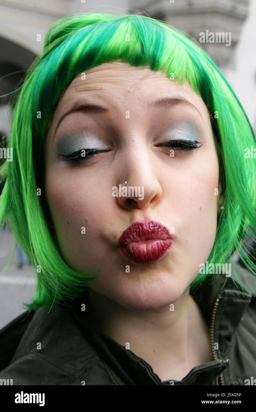 carnival girl girls kiss green mouth carnival exuberance revetment removal wig Stock Photo