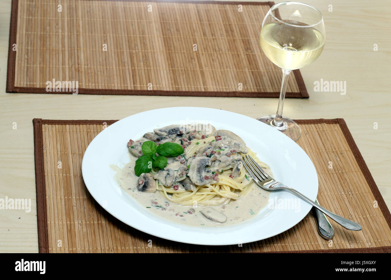 wine spaghetti noodles italian mushroom fungus pasta gravy restaurant glass Stock Photo Alamy