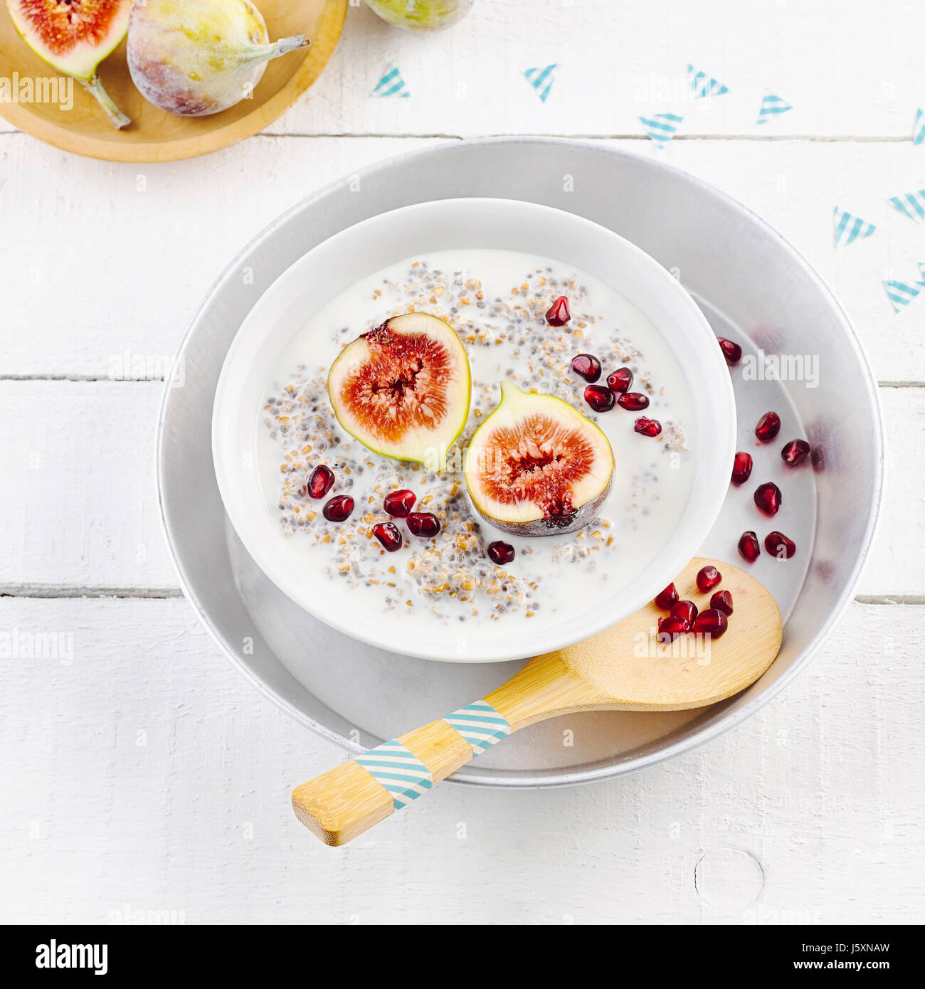 Spelt porridge with chia seeds and figs Stock Photo Alamy