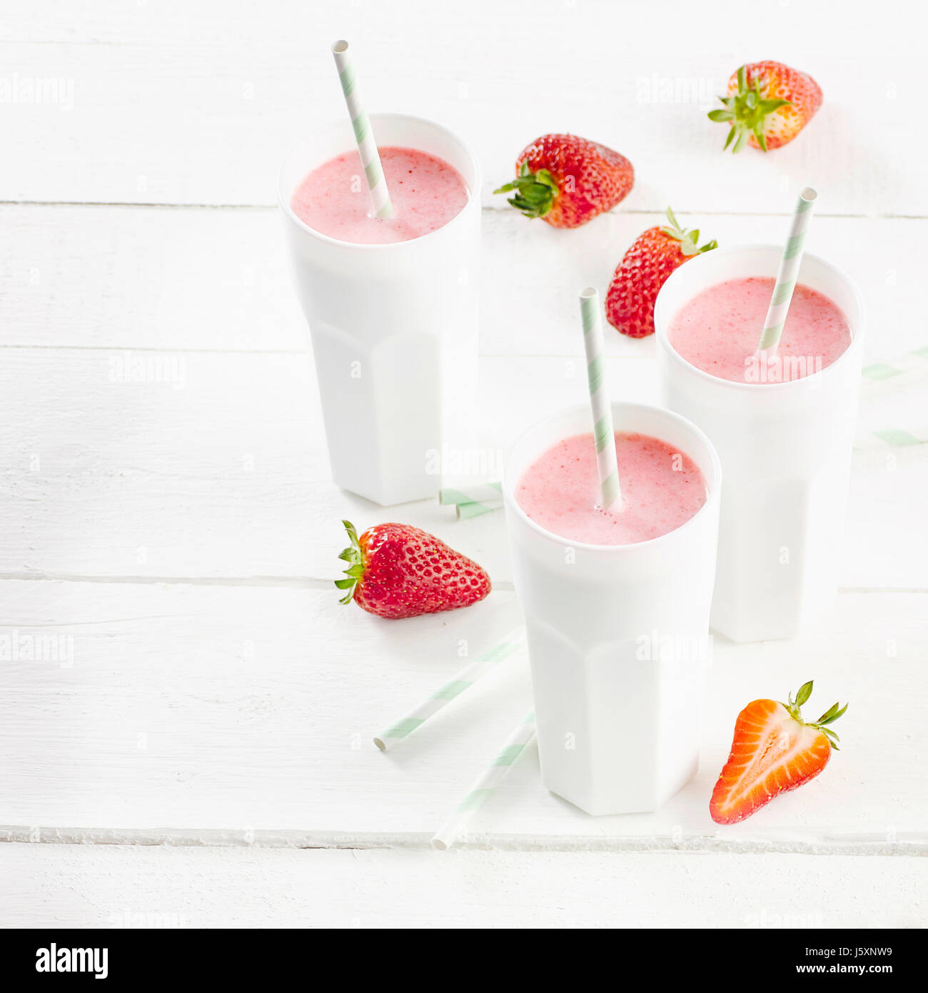 Oat drink with strawberries Stock Photo