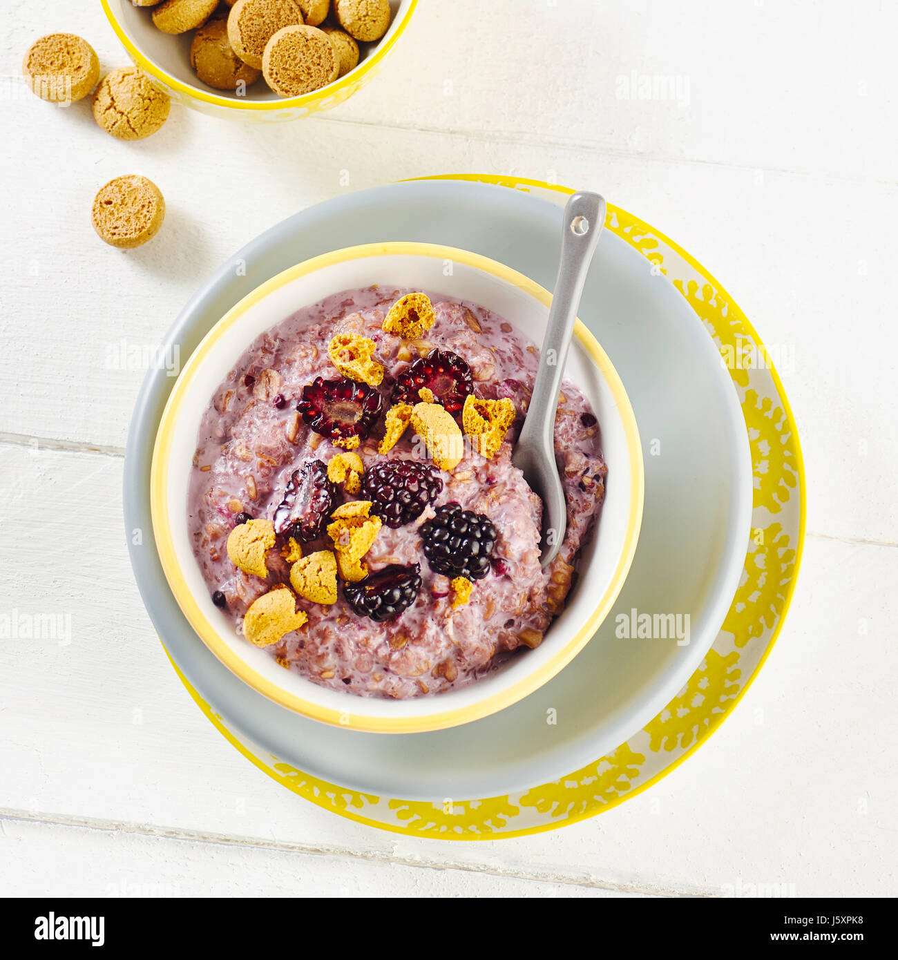 Spelt porridge with blackberries Stock Photo