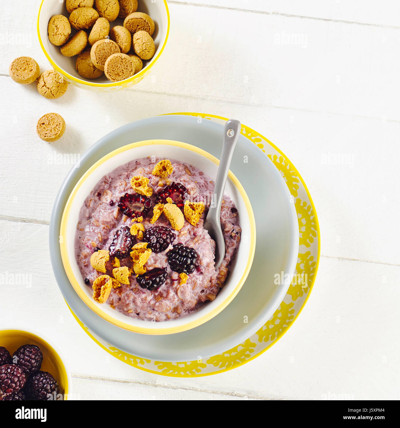 Spelt porridge with blackberries Stock Photo