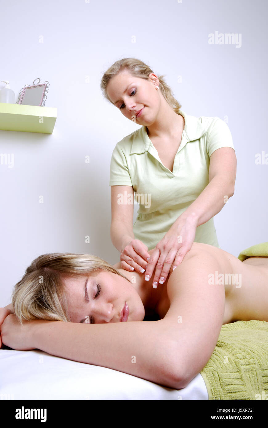woman women wellness massage work job labor laugh laughs laughing twit giggle Stock Photo