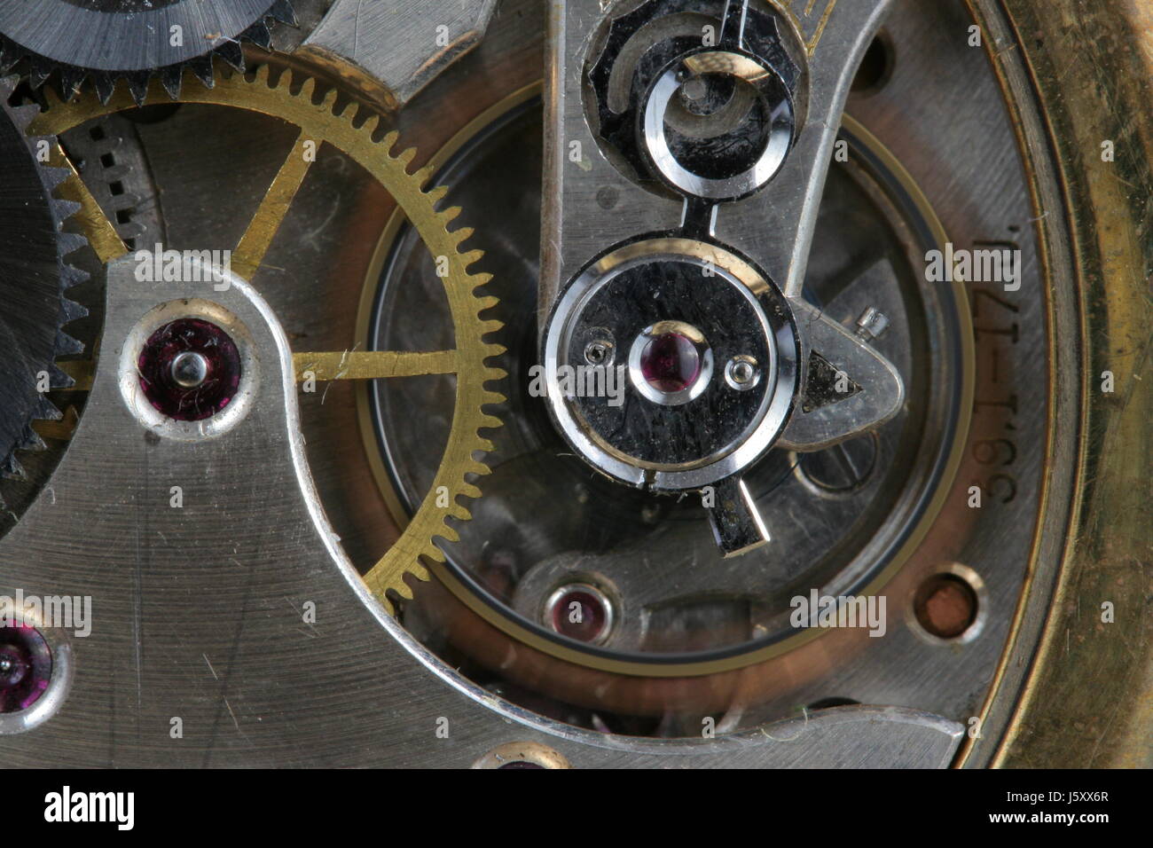 clock wheel cogwheel brass pocket watch anxiety precision engineering camp camp Stock Photo