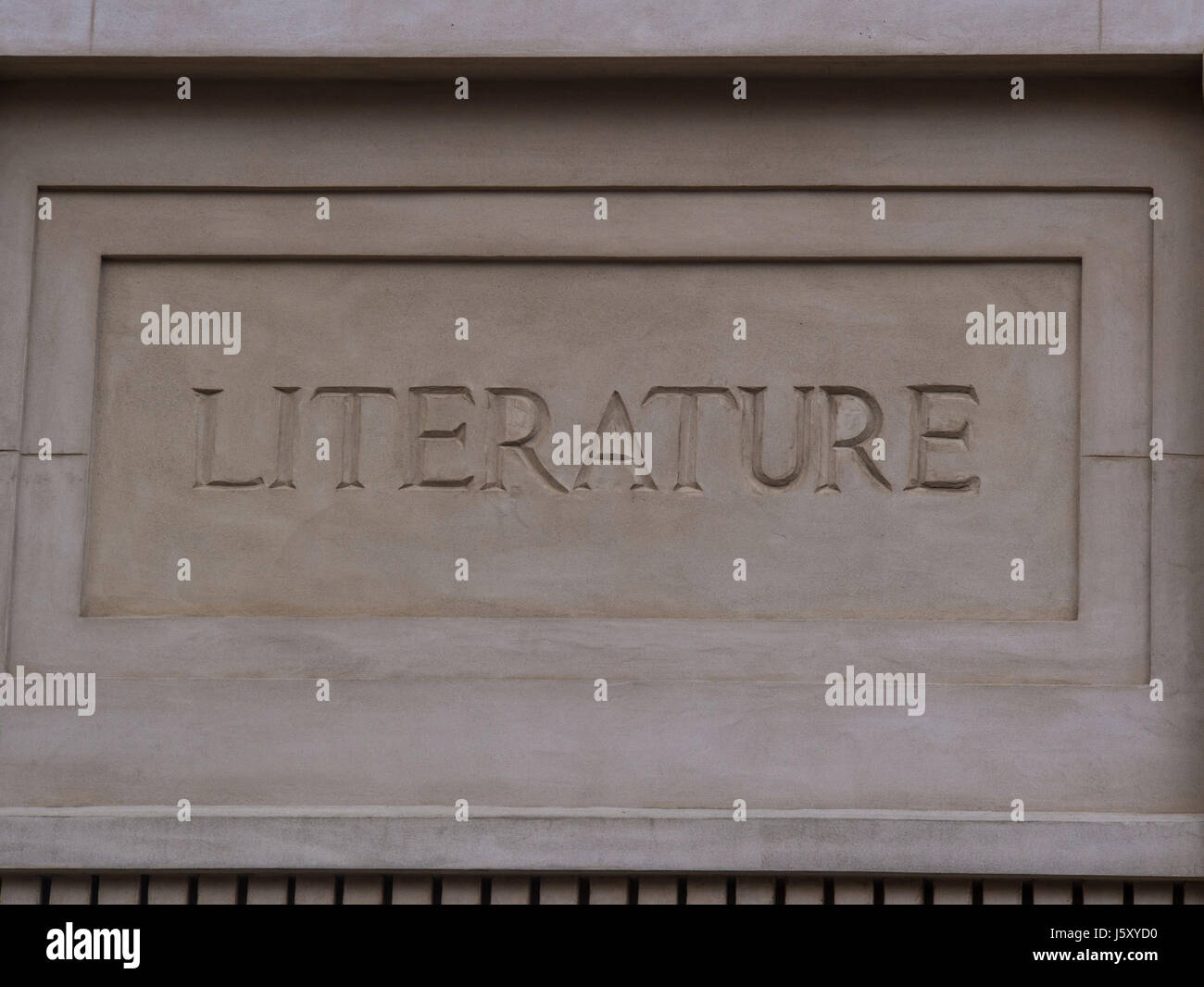 The Word Literature Etched In Stone On The Facade Of A Building Stock Photo