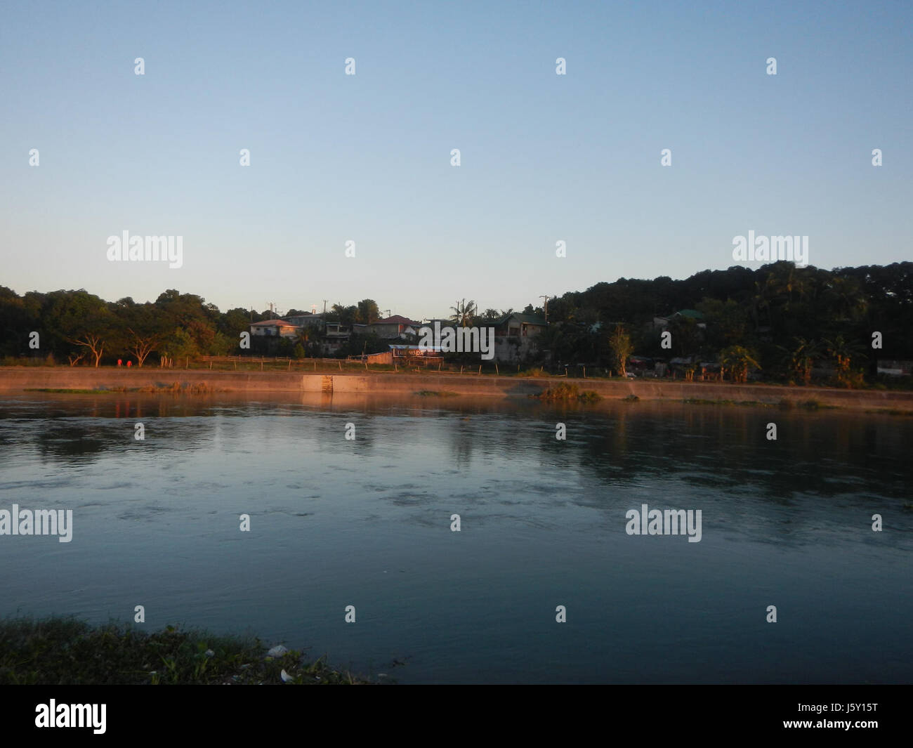 This image illustrates the use of riprap for slope protection along the ...