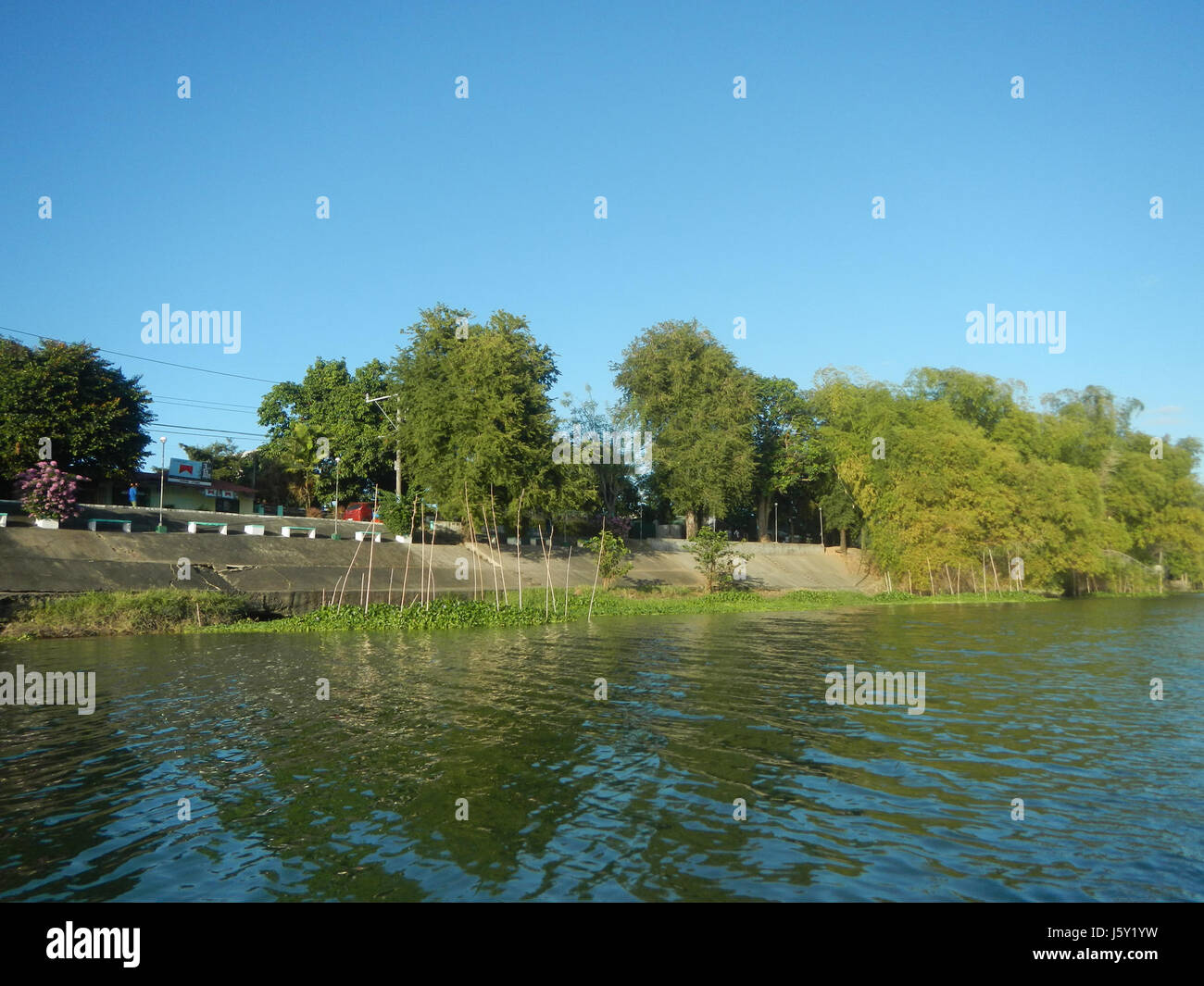 This title captures the construction of riprap along the riverbanks of ...