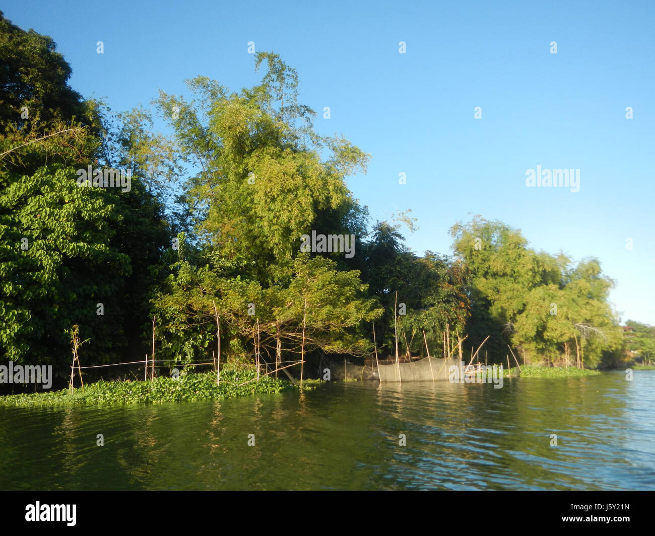 This photograph shows a riprap construction along the riverbanks in ...