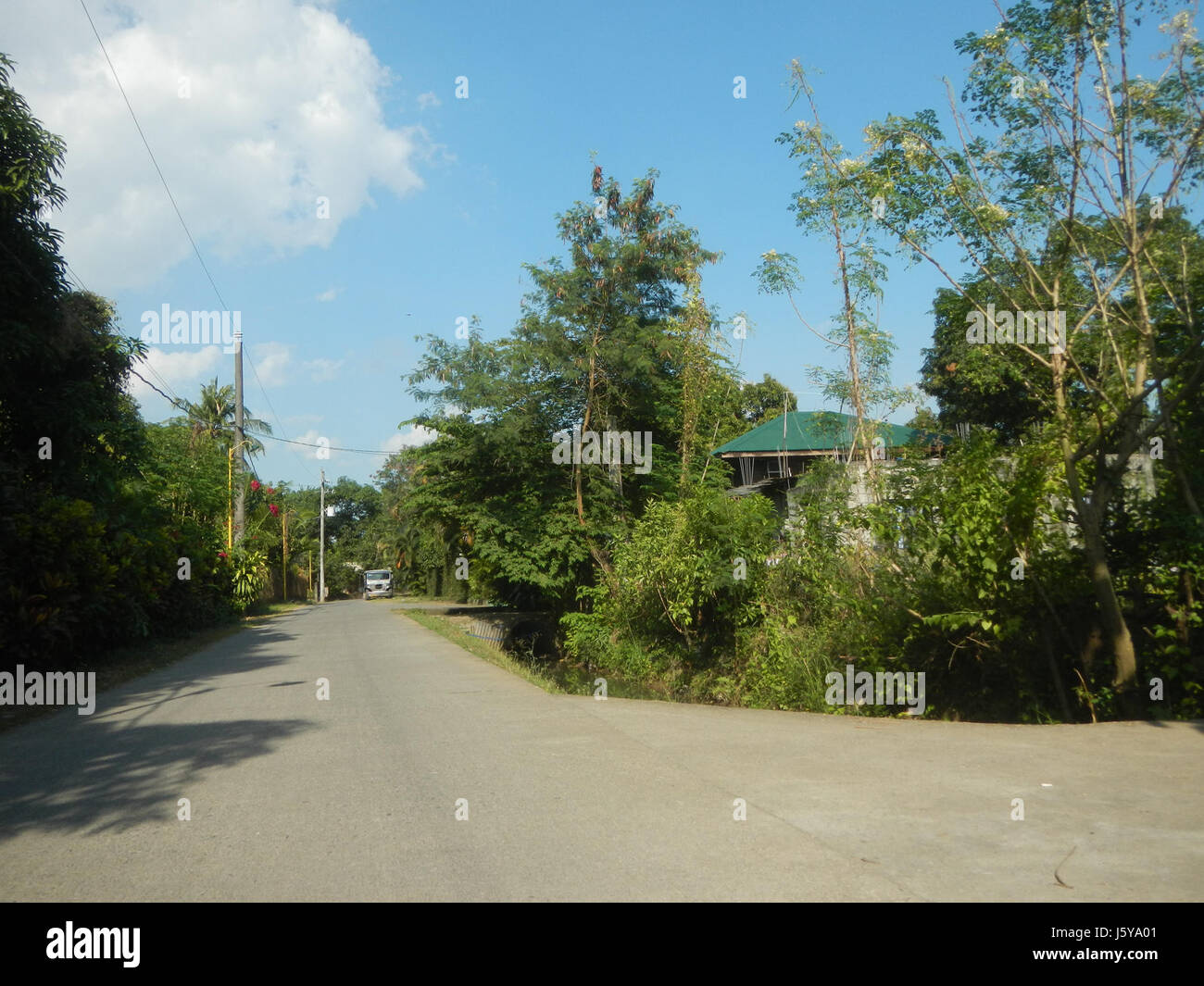 This image captures the farm market road in Lagundi Sipat Dampol ...
