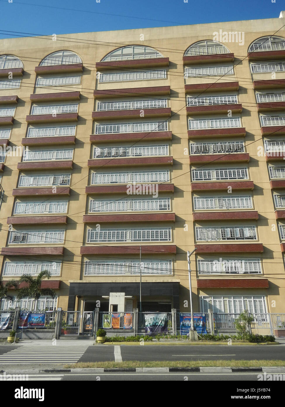 This image shows the Makati Science High School, located in the Cembo area along Kalayaan Avenue, Makati, a prominent educational institution in the Philippines. Stock Photo