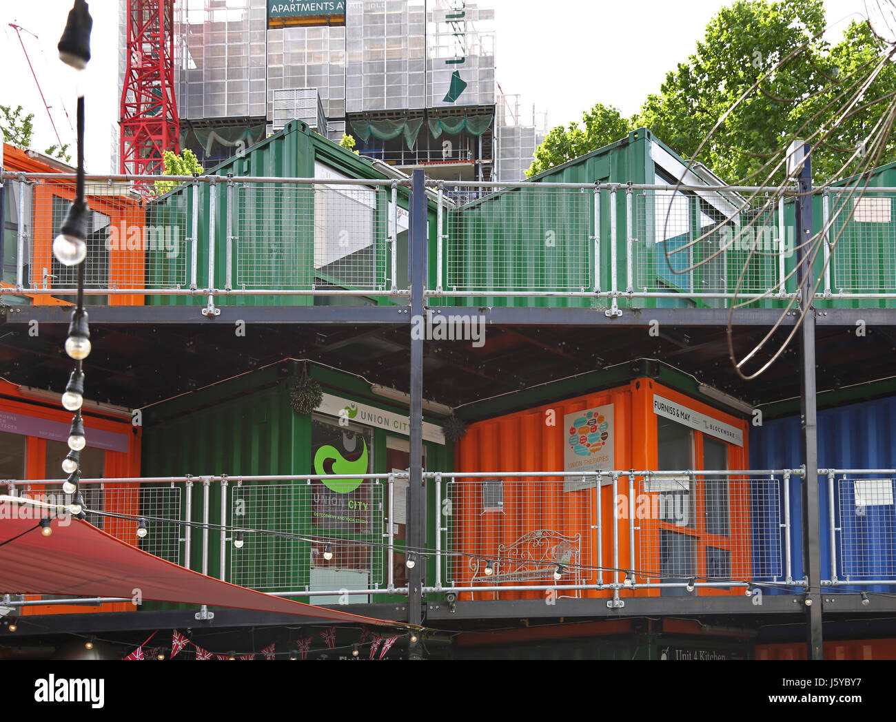The Artworks Elephant, a development of shops offices and cafes in south London constructed from shipping containers. Elephant and Castle. Stock Photo