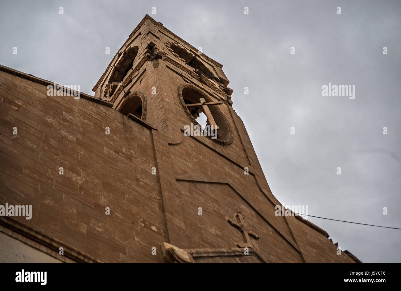 The Immaculate Conception Church tower stands destroyed after ISIS took over the Christian town of Qaraqosh in Iraq which was liberated from Islamic State in 2016. Stock Photo