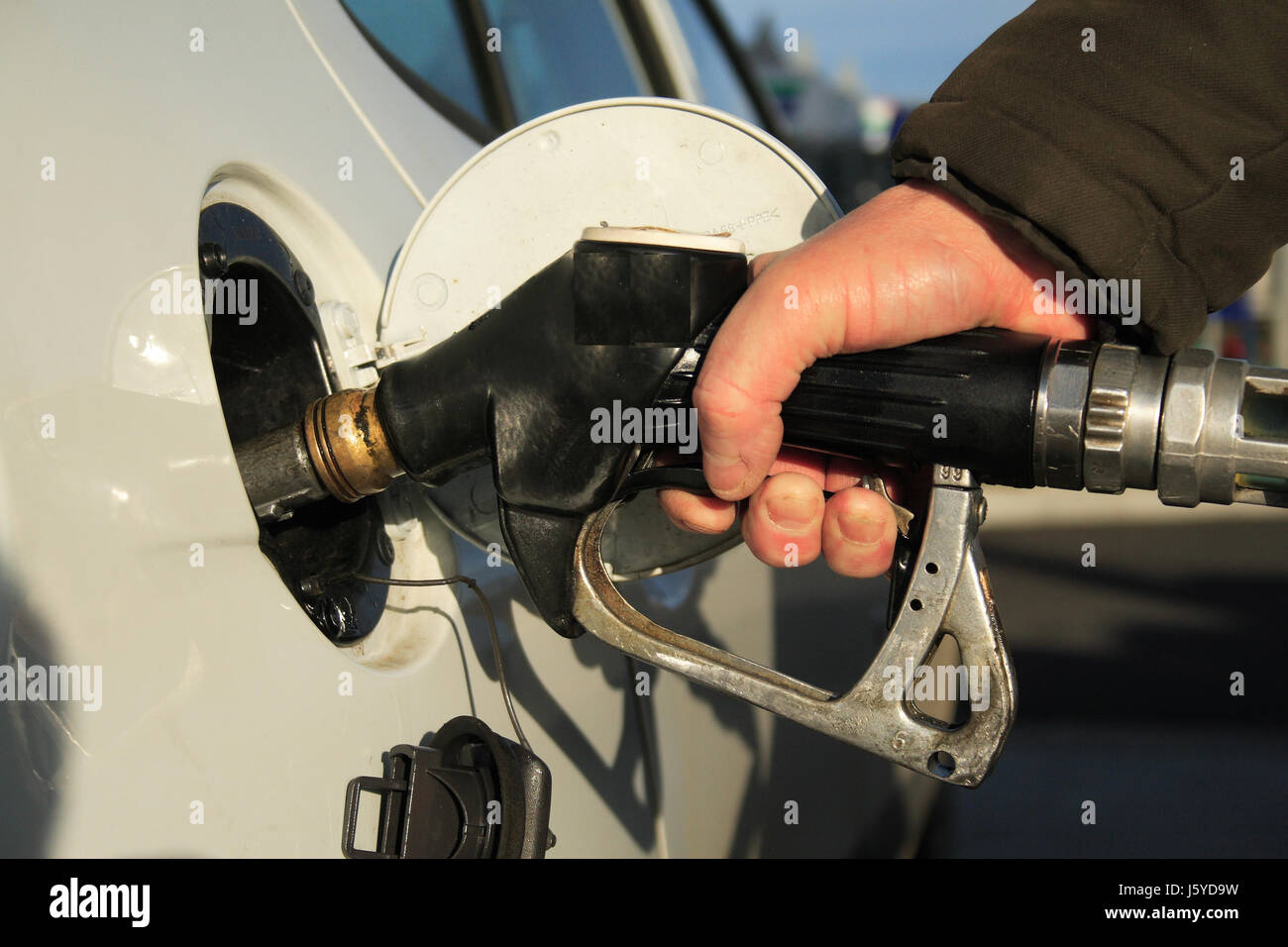 station fuel petrol full reservoir hand service station car automobile vehicle Stock Photo
