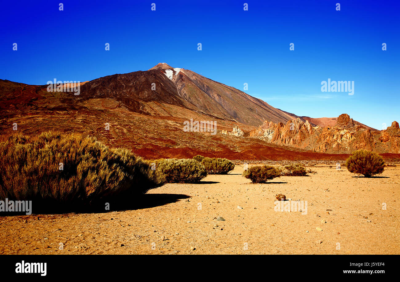 Volcano Teide with Los Roques de Garcia in the foreground, Island Tenerife, Canary Islands, Spain. Stock Photo