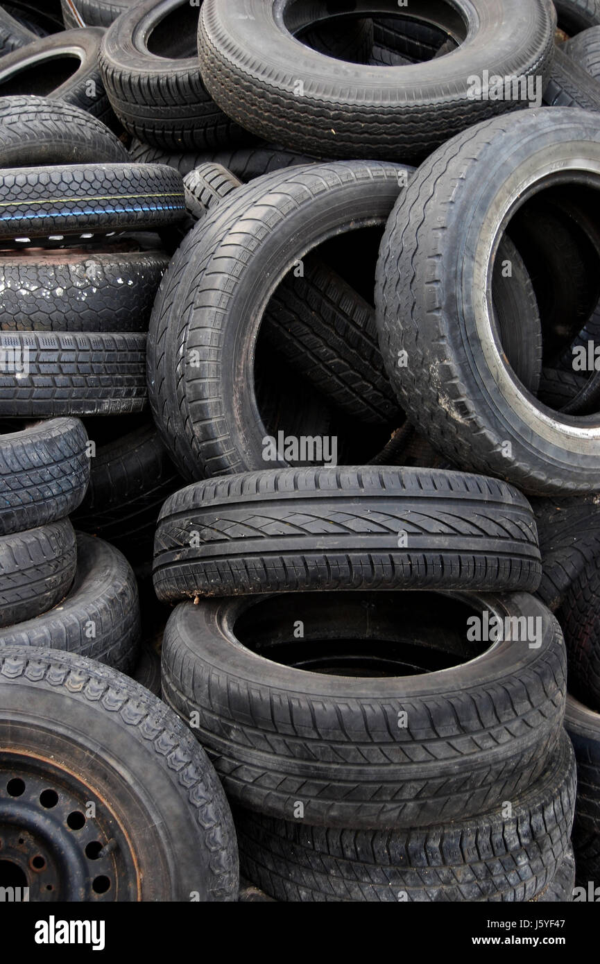 profile disused car tire hazardous waste tyre tire tyres old profile black Stock Photo