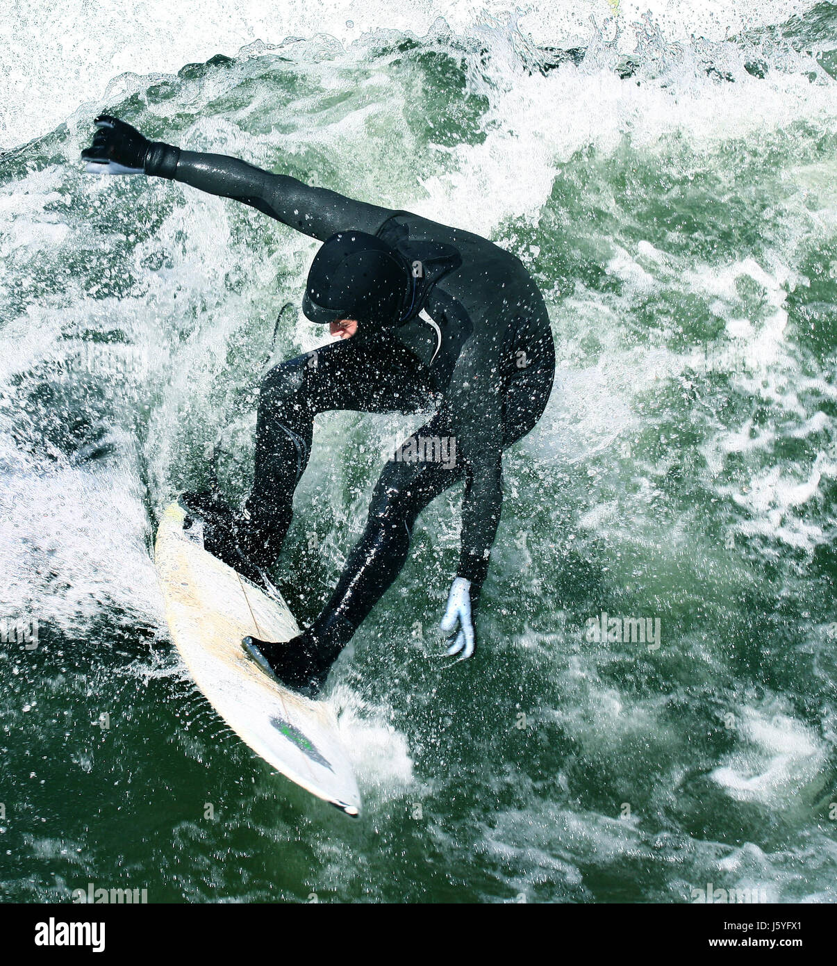 Surfer in diving suit hi-res stock photography and images - Alamy