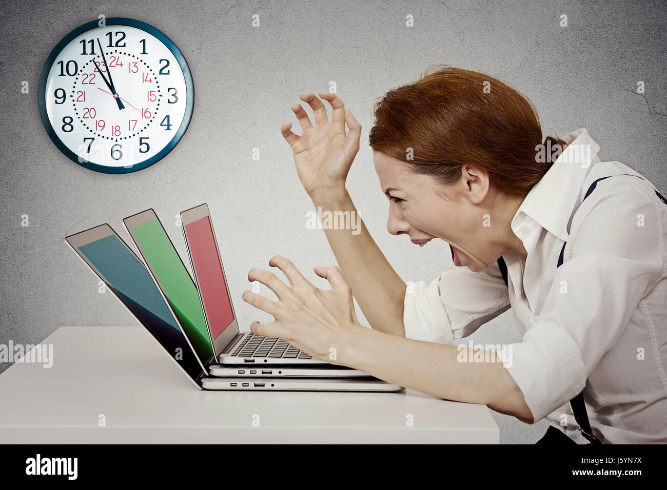 Furious, angry businesswoman screaming at computer, pissed off has ...