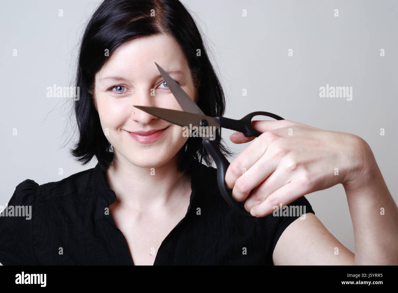 woman with scissors Stock Photo Alamy