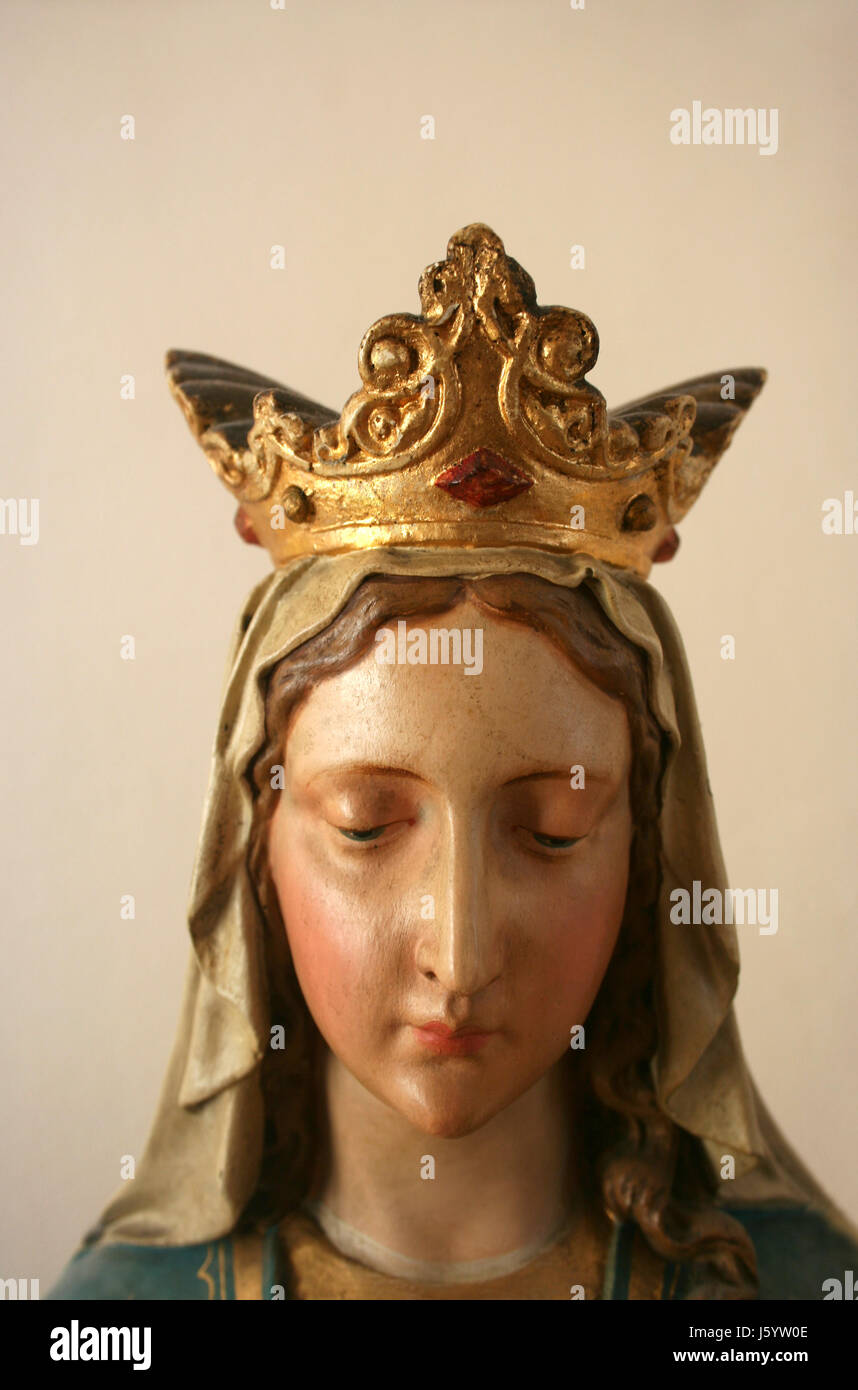 religion catholic antique madonna plaster figure belief church face crown holy Stock Photo