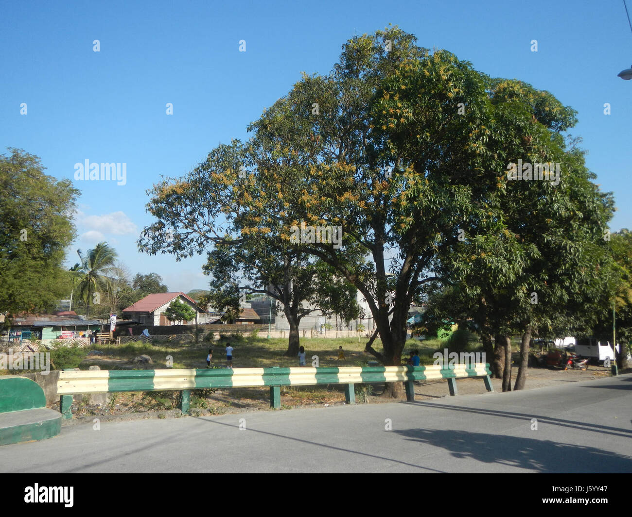 This image showcases the rural fields around Malis Creek River and the ...