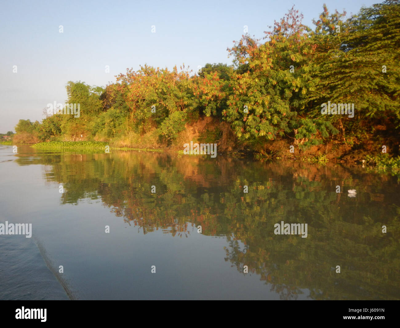 This photograph captures the riversides of the Calumpit and Apalit ...
