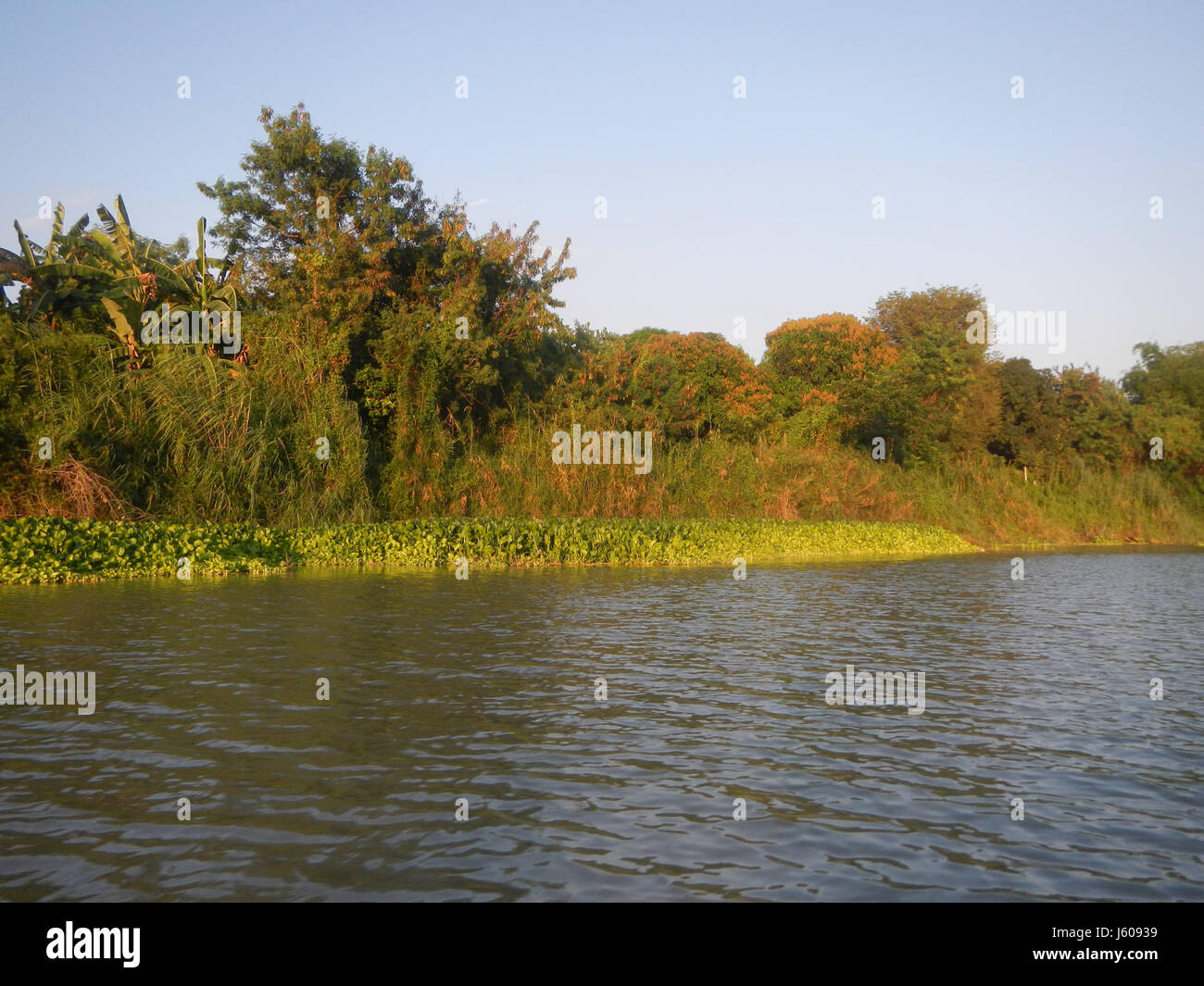 This view captures the riverside districts of Calumpit in Bulacan and ...