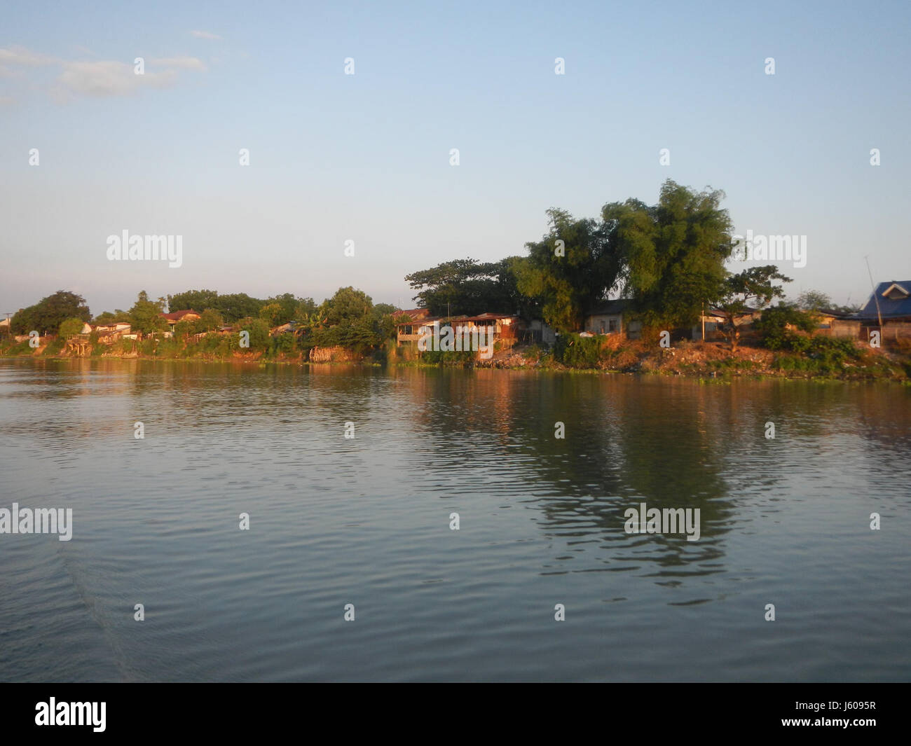 A landscape photograph of the Riverside districts in Calumpit, Bulacan ...