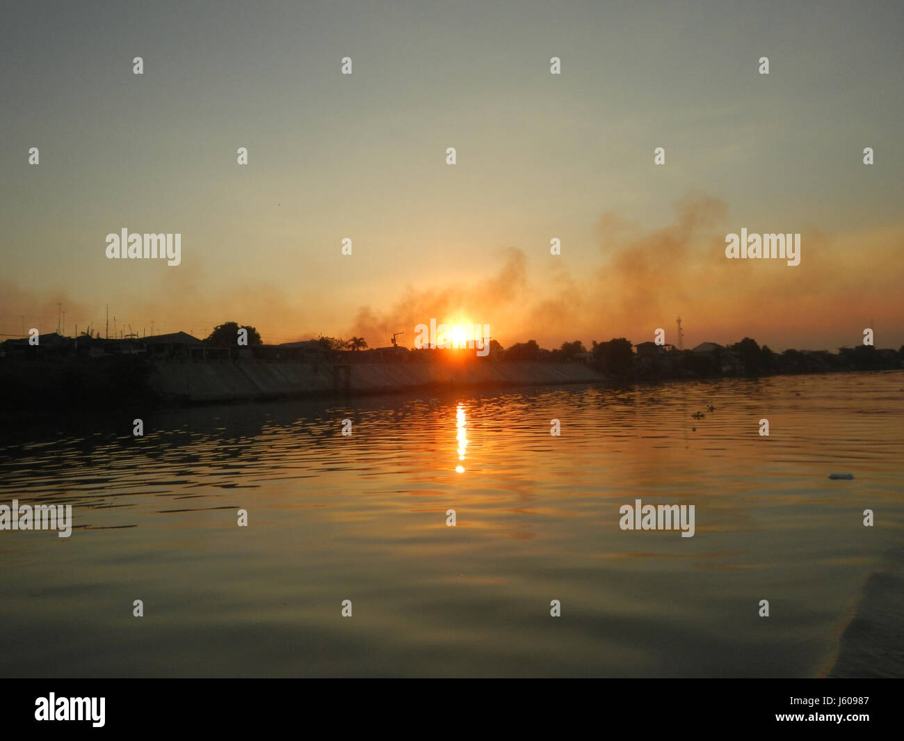 The image depicts a scenic view of riversides and districts in the ...