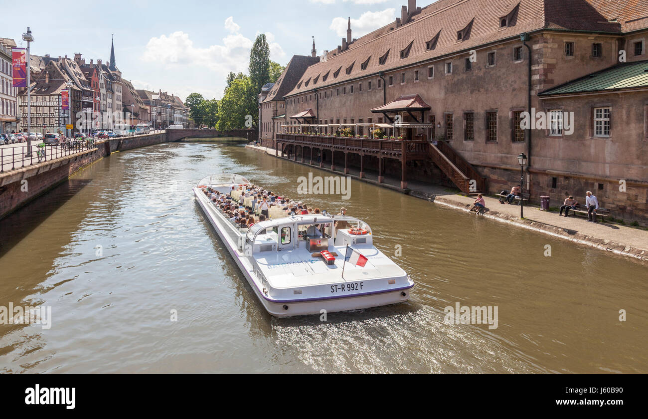 Batorama bateau promenade passing L'Ancienne Douane restaurant, built 1358 on the River Ill in central Strasbourg, Alsace, France Stock Photo