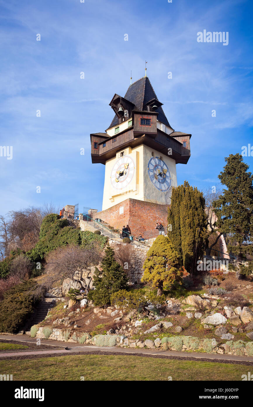 Graz, Austria - January 16, 2011: Tourists visiting Uhrturm old clock ...