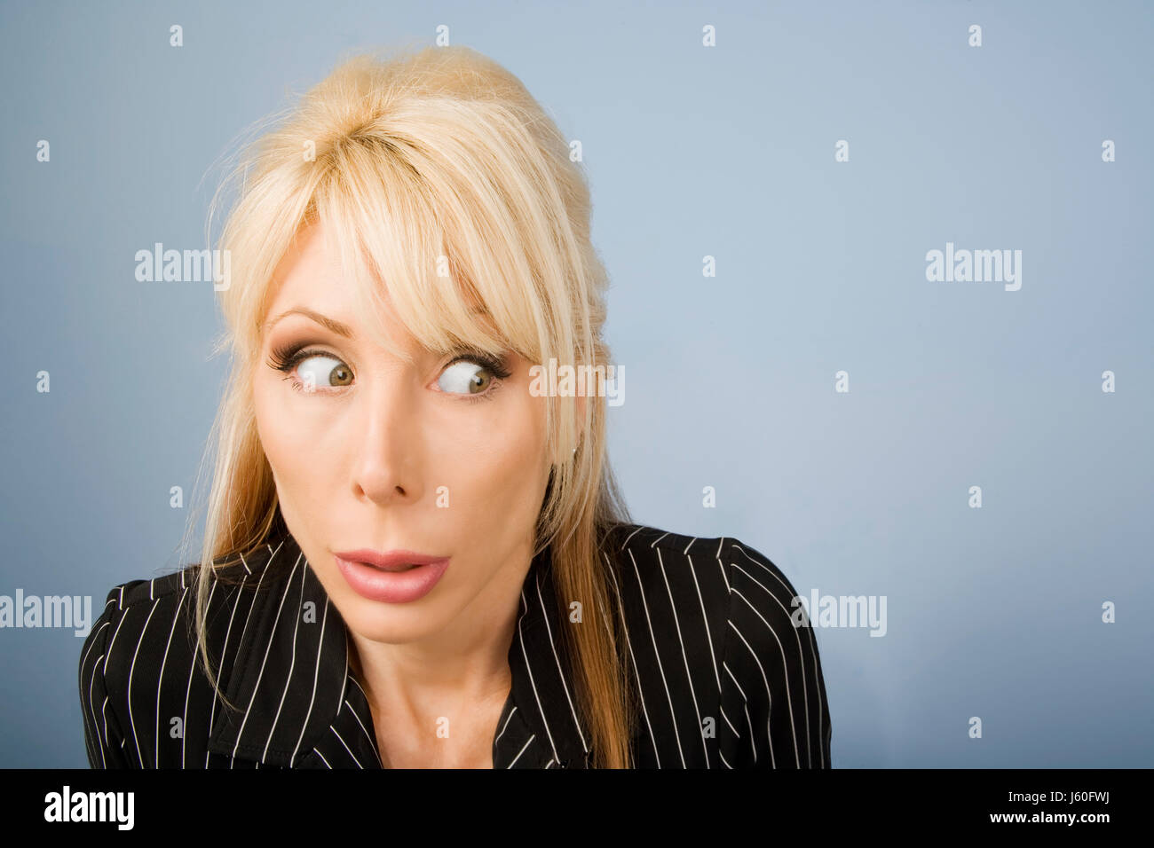 Blonde woman looking sultry hi-res stock photography and images - Alamy