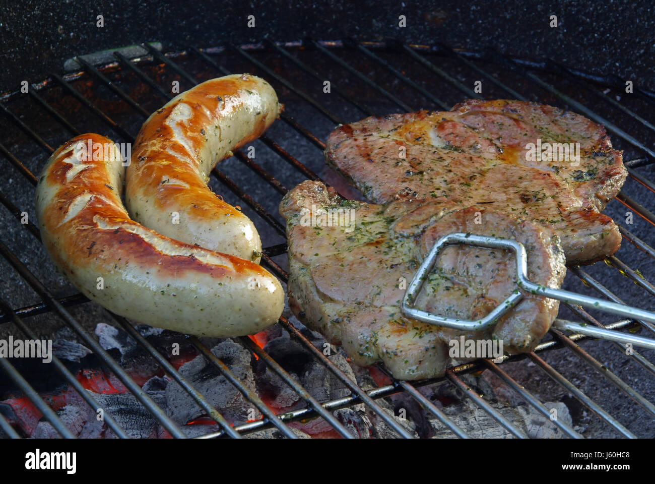 sausage grill barbecue barbeque steak meat food aliment hot boil cooks boiling Stock Photo