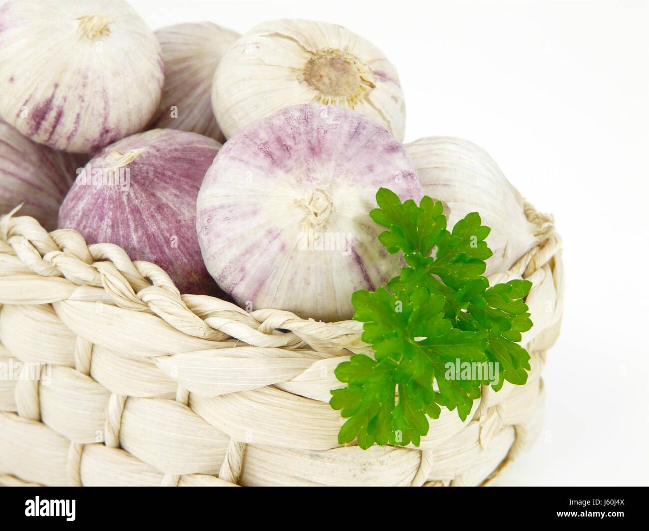 garlic in a basket Stock Photo - Alamy